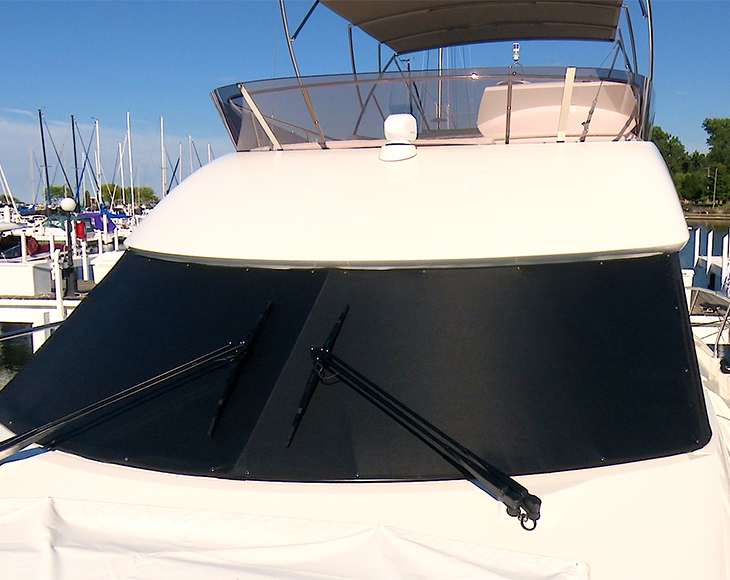 Sunshade installed on our boat's windshield.